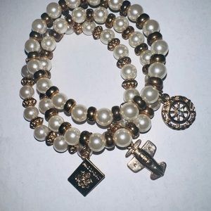 Gold and white bracelet